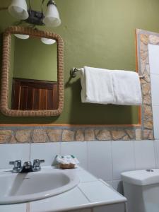 Koupelna v ubytování Hotel La Escalinata
