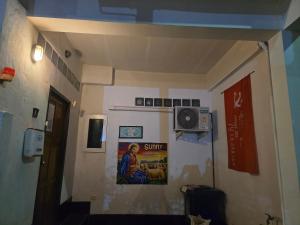 Et tv og/eller underholdning på Jatujak Bangkok guesthouse R8