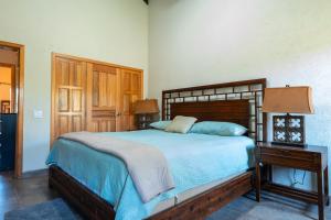 Rúm í herbergi á Casa De Odisea