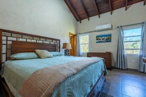 Rúm í herbergi á Casa De Odisea