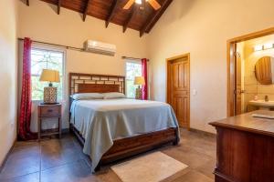 Rúm í herbergi á Casa De Odisea