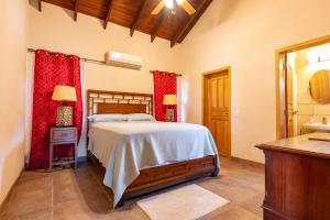 Rúm í herbergi á Casa De Odisea