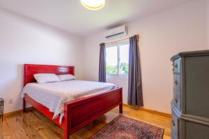 Postel nebo postele na pokoji v ubytování Odyssey Home
