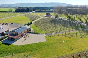 an aerial view of a house in a vineyard at Gatekeepers Cottage - Idyllic 4 Bed Rural Escape! in Cropthorne