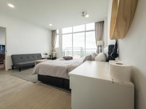 TV a/nebo společenská místnost v ubytování Stirling Homestay by Evernent + 3 fotografie