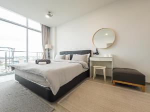 Postel nebo postele na pokoji v ubytování Stirling Homestay by Evernent