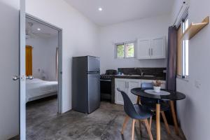 Η κουζίνα ή μικρή κουζίνα στο El Patio de Lucia Residencia +3 φωτογραφίες