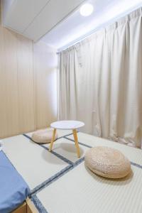 Katil atau katil-katil dalam bilik di Ah Shan Hostel