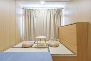 Katil atau katil-katil dalam bilik di Ah Shan Hostel