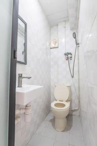 Bilik mandi di Ah Shan Hostel