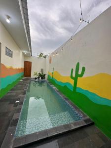 Bazén v ubytování Villa Manalagi nebo v jeho okolí