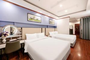 Voodi või voodid majutusasutuse A25 Hotel - 53 Tuệ Tĩnh toas