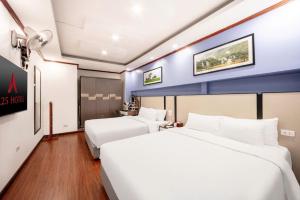 Voodi või voodid majutusasutuse A25 Hotel - 53 Tuệ Tĩnh toas