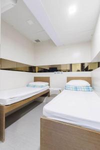 Katil atau katil-katil dalam bilik di Ah Shan Hostel