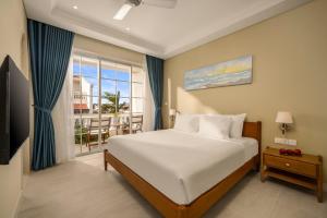 Sjónvarps- og/eða afþreyingartæki á Spring Breeze Hotel Hoi An