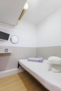 Katil atau katil-katil dalam bilik di Ah Shan Hostel