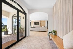 Ένα ή περισσότερα κρεβάτια σε δωμάτιο στο Querida Villa