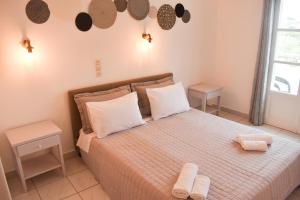 Postel nebo postele na pokoji v ubytování Alfa Rooms