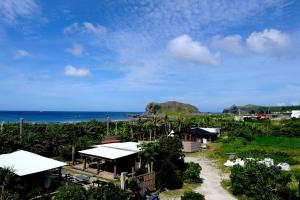 a view of the ocean from a resort at The Reef 綠芙 in Green Island