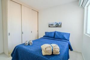 Ένα ή περισσότερα κρεβάτια σε δωμάτιο στο Apartamento de 2 habitaciones en Cartagena