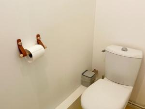 a bathroom with a toilet and a roll of toilet paper at Gîte tout confort 2 ch, jardin, proche Blois & Chambord - FR-1-491-463 in Saint-Claude-de-Diray +6 photos