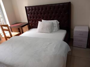 Afbeelding uit fotogalerij van MAISON DE OMASHI GUEST ROOM AND Suites in Kigali +19 foto's