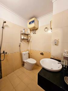 Koupelna v ubytování Rainbow HomeStay - No 8 Alley 18B Tong Dan