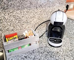 a blender sitting on a counter next to a box at Pont Vell in Montblanc