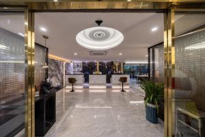 Vstupní hala nebo recepce v ubytování 颐程City View Hotel-广州太古汇珠江新城体育中心石牌桥地铁站店-广交会专享