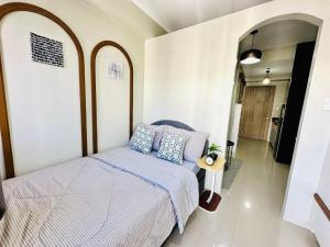 Postel nebo postele na pokoji v ubytování Peaceful Nest at Shore 2 Res