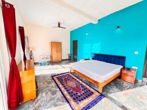 Postel nebo postele na pokoji v ubytování Hiteshi Homestay