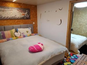 Letto o letti in una camera di Chez Gigi