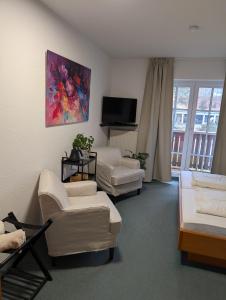 Postel nebo postele na pokoji v ubytování Parkhotel Bad Brambach