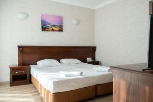 Postel nebo postele na pokoji v ubytování Marmaris Alkan Hotel
