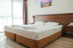 Postel nebo postele na pokoji v ubytování Marmaris Alkan Hotel