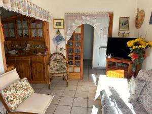 TV a/nebo společenská místnost v ubytování Casa di Ilde