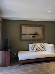 TV a/nebo společenská místnost v ubytování Bacau Bay Resort Coron