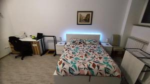 Posteľ alebo postele v izbe v ubytovaní Work and Play Apartment