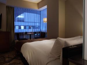 Postel nebo postele na pokoji v ubytování Akasaka Granbell Hotel