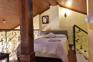 Postel nebo postele na pokoji v ubytování Las Mansiones de Constitución ApartamentosMalagaManagement