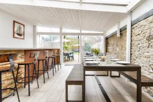 Et opholdsområde på Maison avec jardin pour 8 à 550m de la plage