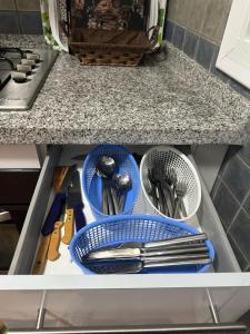 Kuchyň nebo kuchyňský kout v ubytování Fnideq Superbe appartement