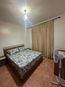 Postel nebo postele na pokoji v ubytování Fnideq Superbe appartement