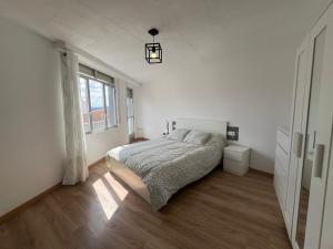 Postel nebo postele na pokoji v ubytování YourHouse Balcon de las Mareas