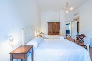 Postel nebo postele na pokoji v ubytování Al Palmento Relais