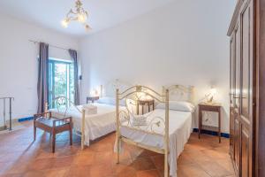 Postel nebo postele na pokoji v ubytování Al Palmento Relais