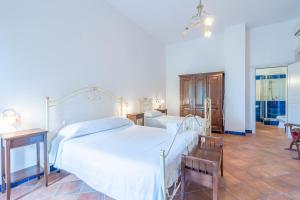 Postel nebo postele na pokoji v ubytování Al Palmento Relais