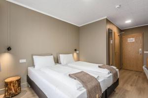 Stracta Hotel Mosfell客房内的一张或多张床位