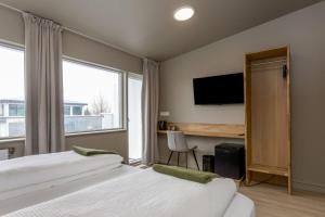 Stracta Hotel Mosfell客房内的一张或多张床位