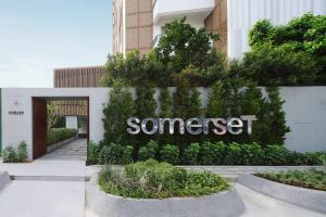 a sign that reads somerset in front of a building at Somerset Sukhumvit 71 Bangkok in Bangkok